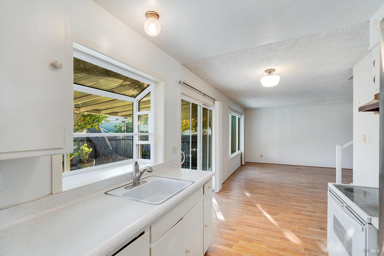 5158 Parkhurst Drive Santa Rosa, CA 95409 - Photo 19 of 40 a bathroom with a sink and a large window