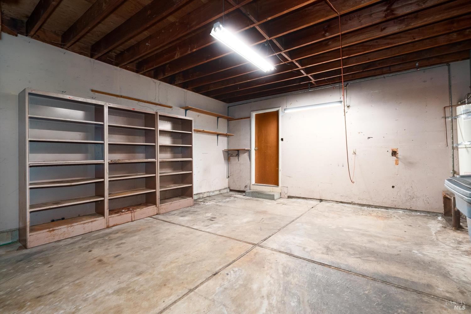 5158 Parkhurst Drive Santa Rosa, CA 95409 - Photo 22 of 40 a view of an empty room with a staircase