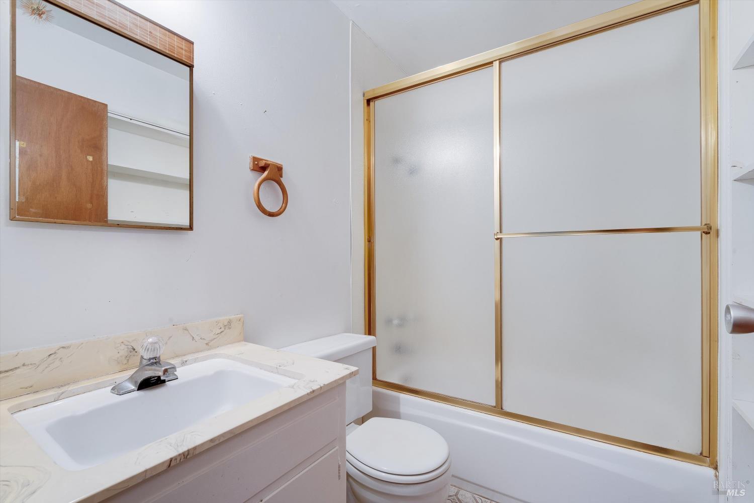 5158 Parkhurst Drive Santa Rosa, CA 95409 - Photo 24 of 40 a bathroom with a sink toilet and shower