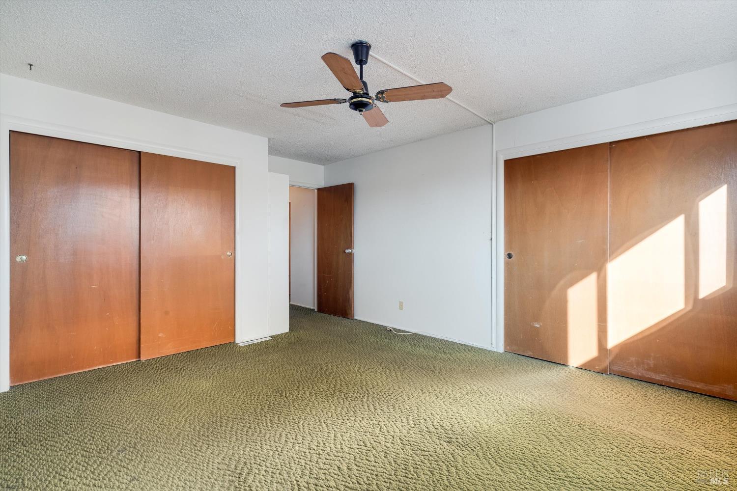 5158 Parkhurst Drive Santa Rosa, CA 95409 - Photo 27 of 40 a view of a livingroom with a ceiling fan and window