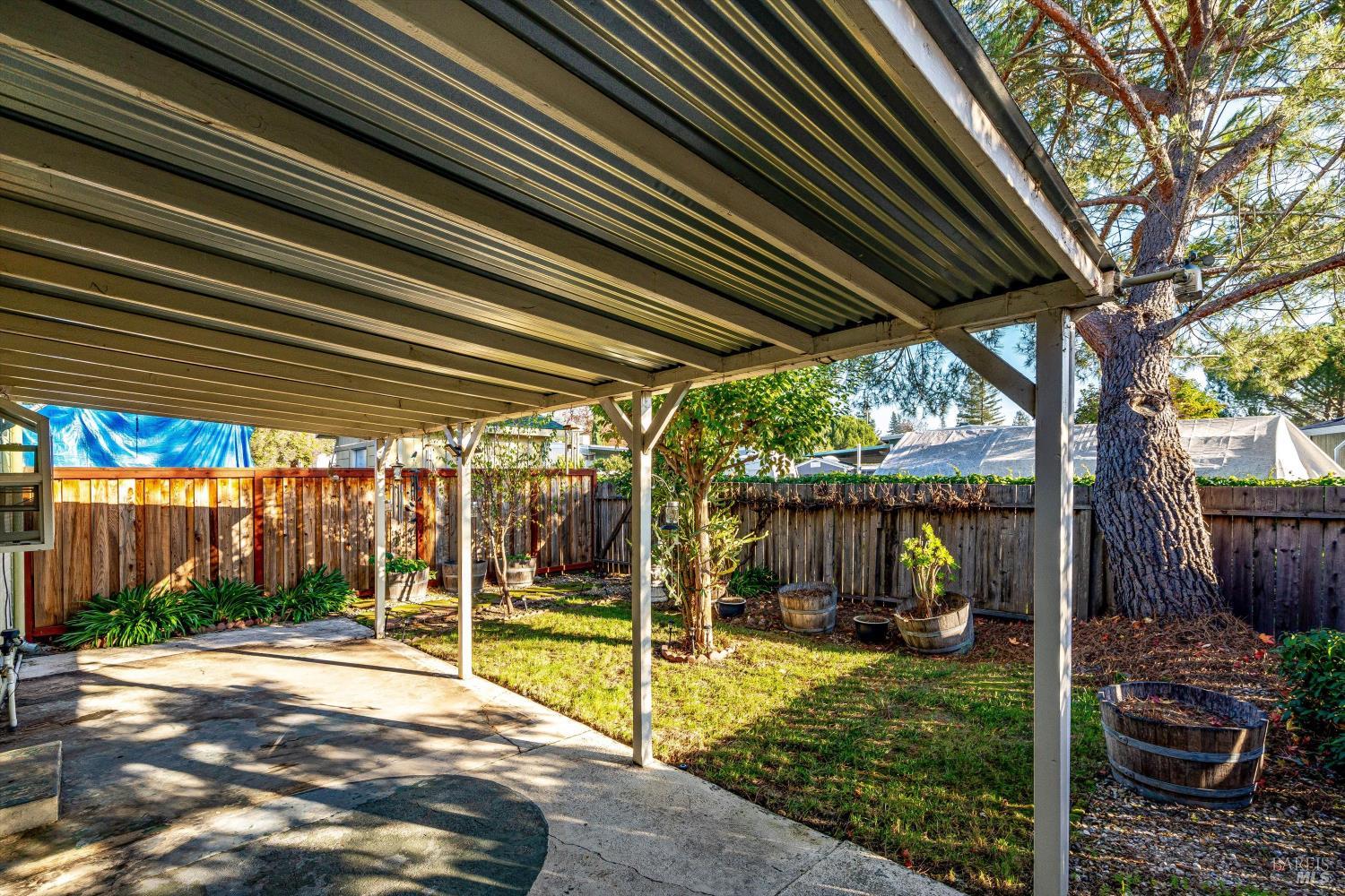5158 Parkhurst Drive Santa Rosa, CA 95409 - Photo 31 of 40 a view of a backyard with a small cabin