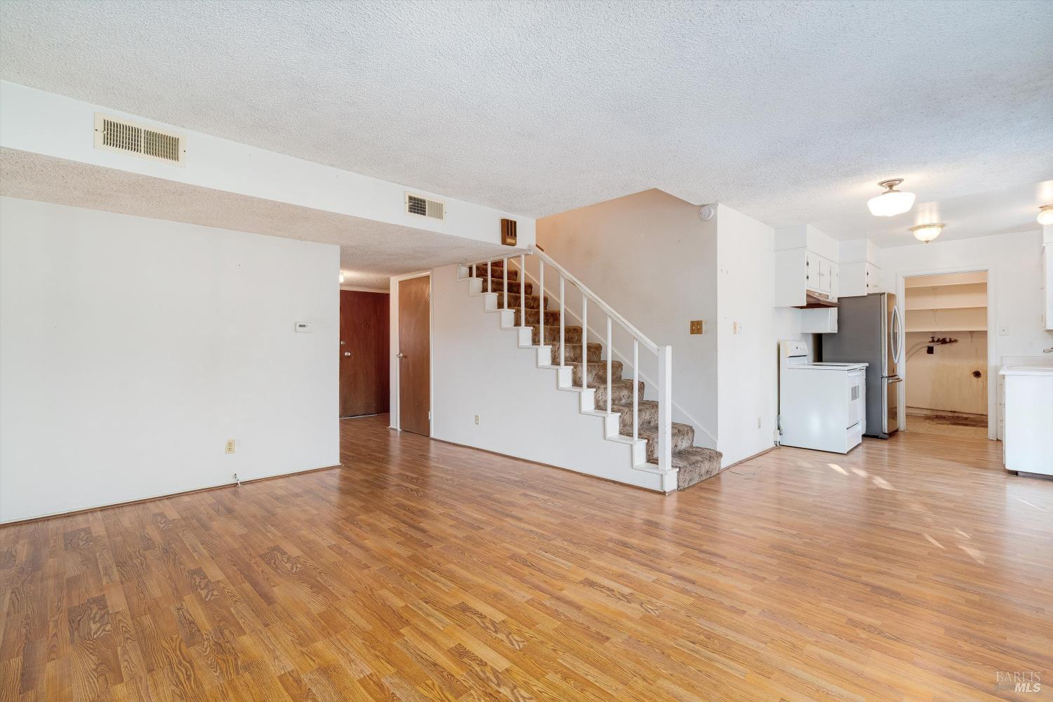 5158 Parkhurst Drive Santa Rosa, CA 95409 - Photo 10 of 40 a view of an entryway with wooden floor