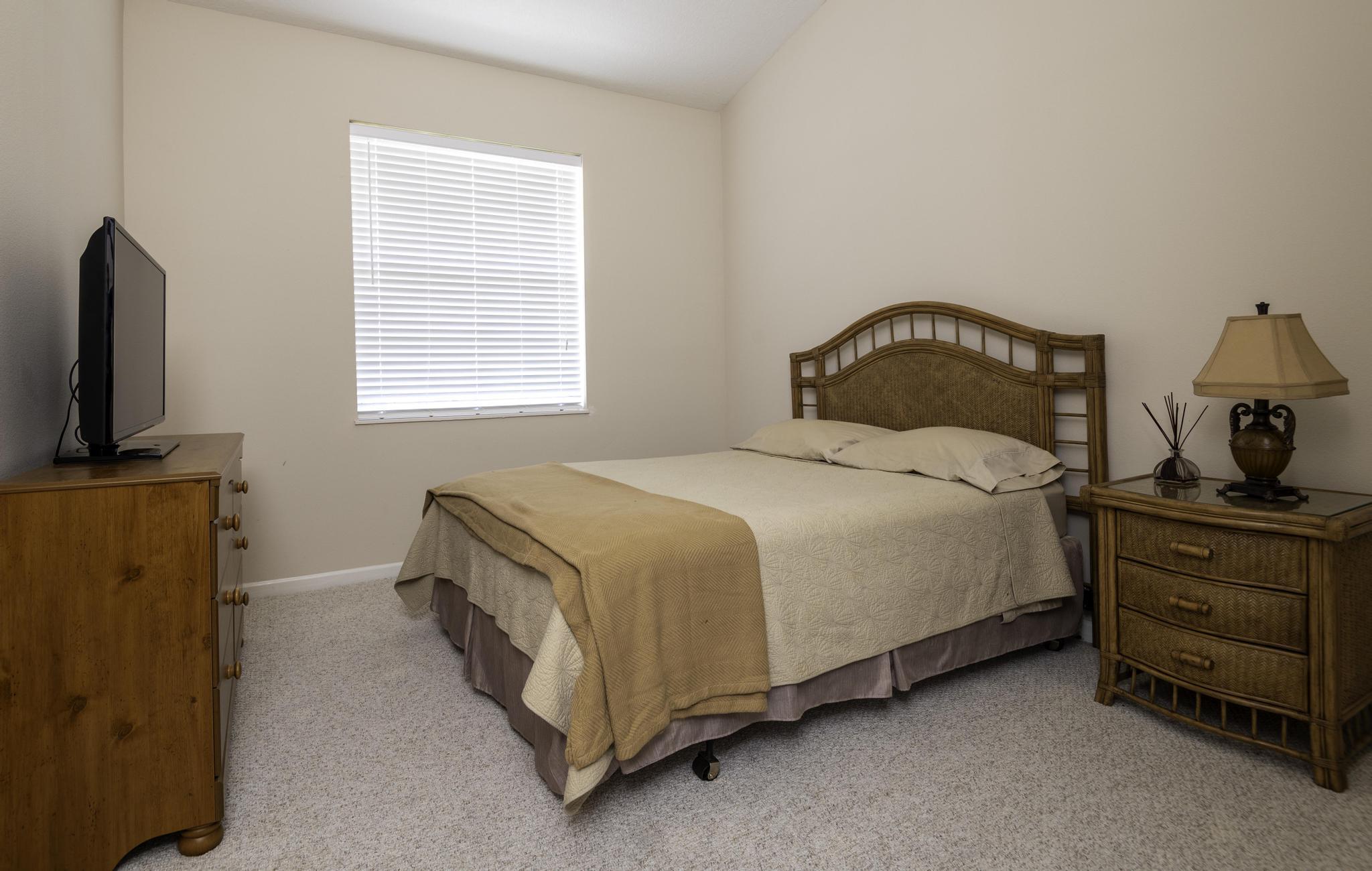 511 Northwest Red Pine Way Jensen Beach, FL 34957 - Photo 29 of 67 Guest Bedroom
