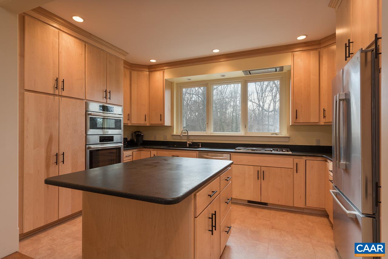 1339 Hilltop Road Charlottesville, VA 22903 - Photo 14 of 24 a kitchen with stainless steel appliances granite countertop a refrigerator a sink and a stove