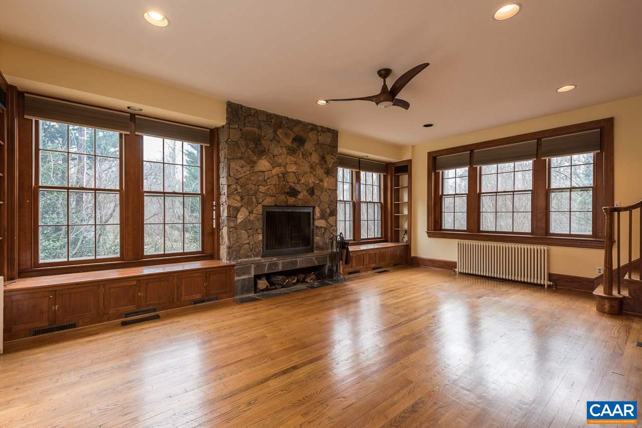 1339 Hilltop Road Charlottesville, VA 22903 - Photo 15 of 24 a view of an empty room with glass door and a window