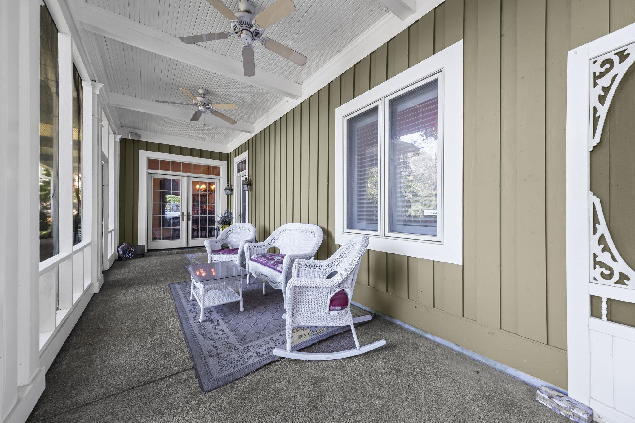 450 Cherry Road Eads, TN 38028 - Photo 2 of 24 View of patio featuring a sunroom