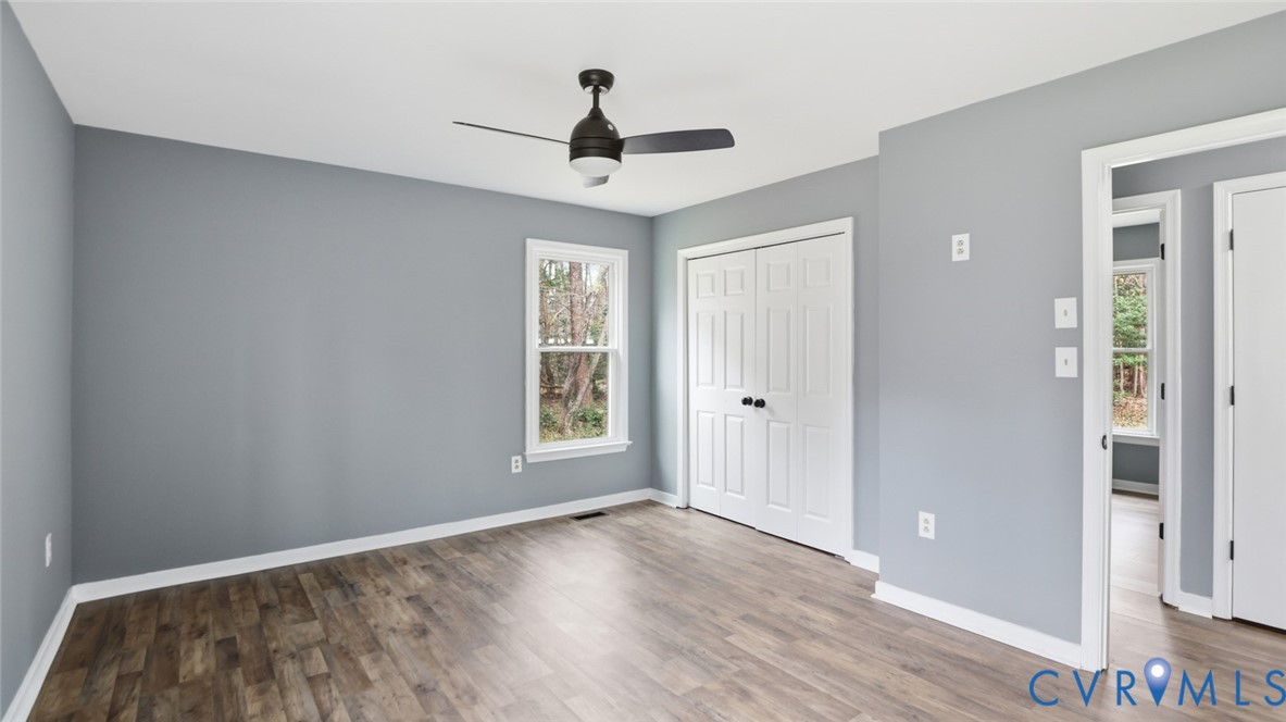 3063 Three Chopt Road Gum Spring, VA 23065 - Photo 26 of 45 a view of empty room with wooden floor and fan