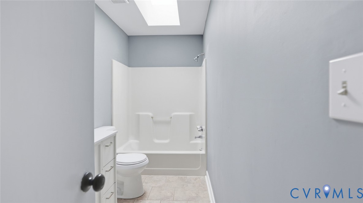 3063 Three Chopt Road Gum Spring, VA 23065 - Photo 29 of 45 a bathroom with a toilet and a shower