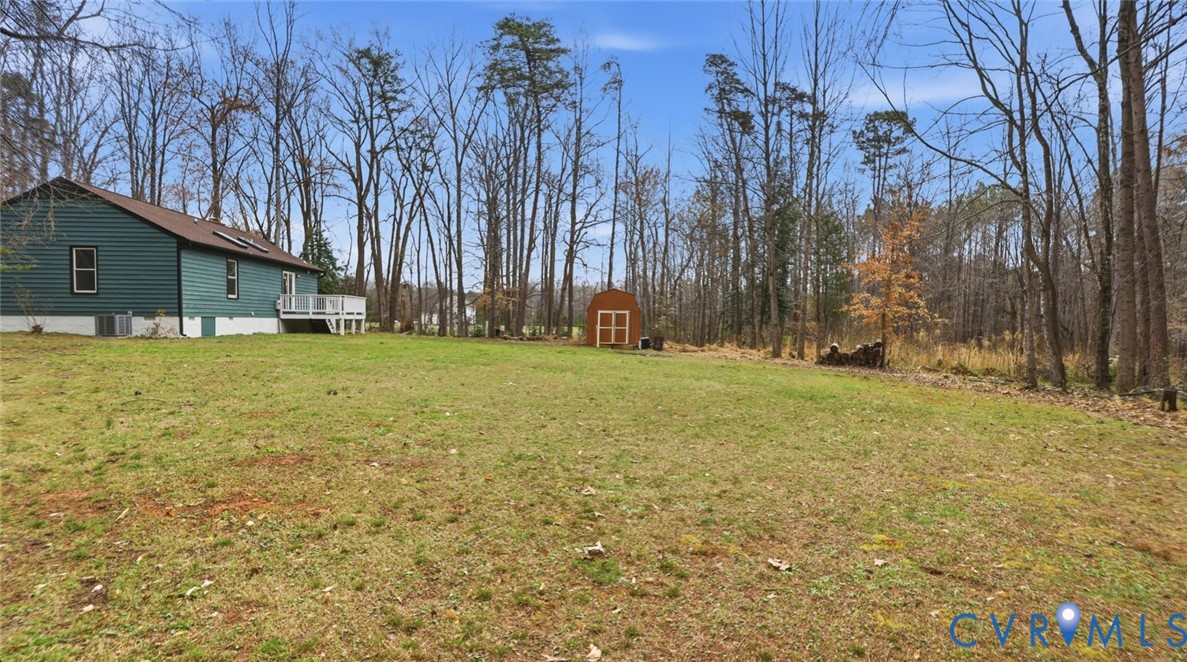 3063 Three Chopt Road Gum Spring, VA 23065 - Photo 35 of 45 a view of a yard with large trees
