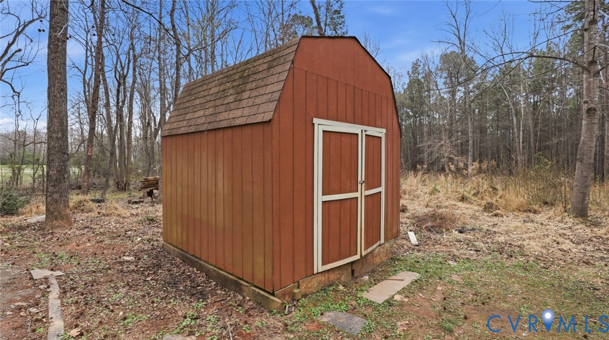 3063 Three Chopt Road Gum Spring, VA 23065 - Photo 37 of 45 a view of backyard with tree