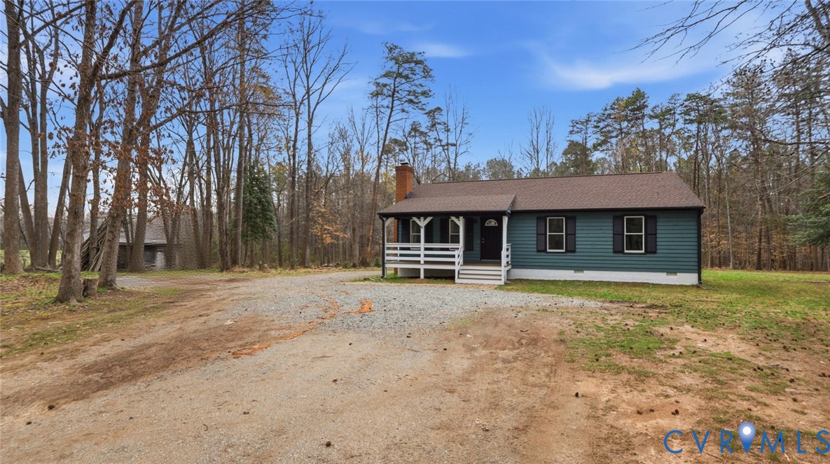 3063 Three Chopt Road Gum Spring, VA 23065 - Photo 40 of 45 a front view of a house with garden