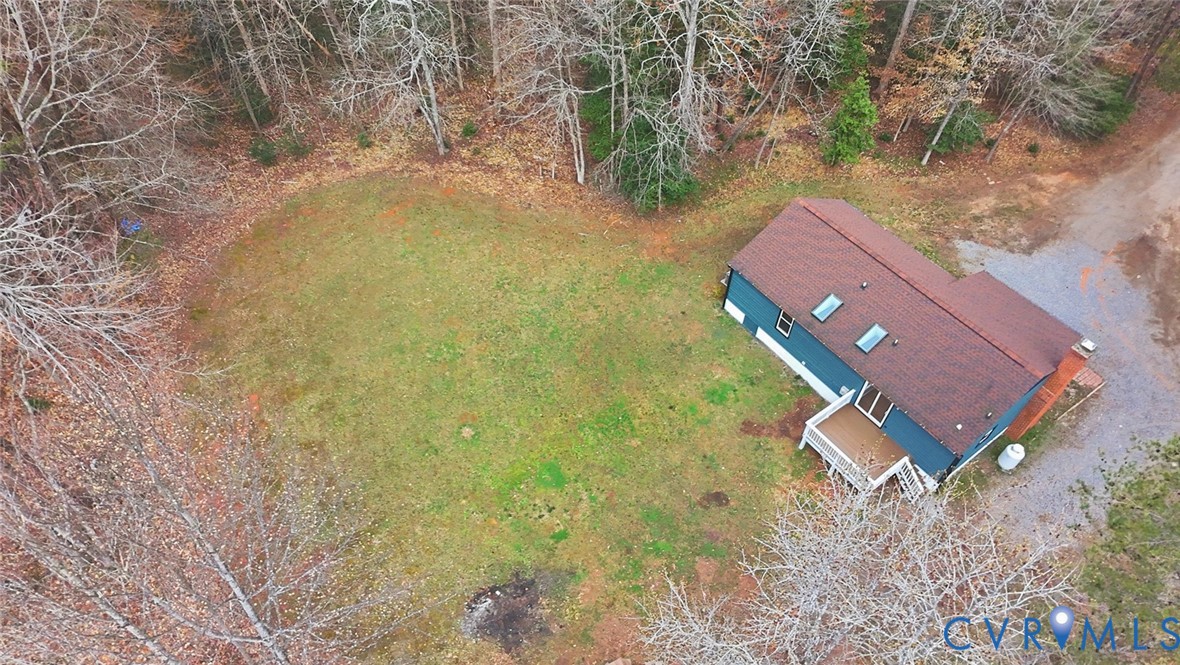 3063 Three Chopt Road Gum Spring, VA 23065 - Photo 41 of 45 a view of a yard with a trees