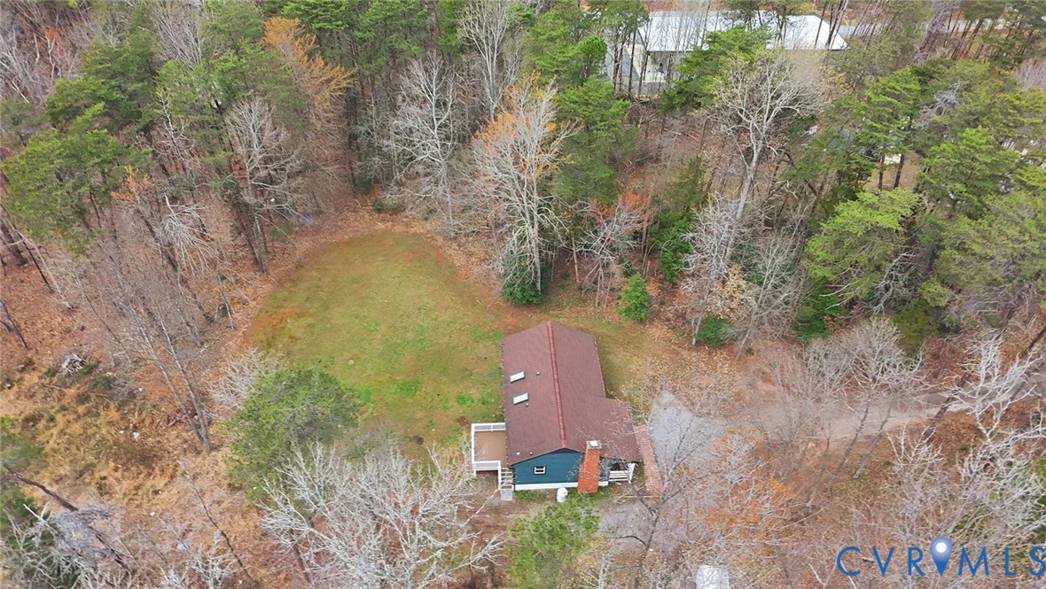 3063 Three Chopt Road Gum Spring, VA 23065 - Photo 43 of 45 an aerial view of a house with outdoor space and trees all around