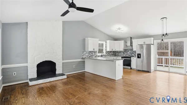 a kitchen with a cabinets and a stove
