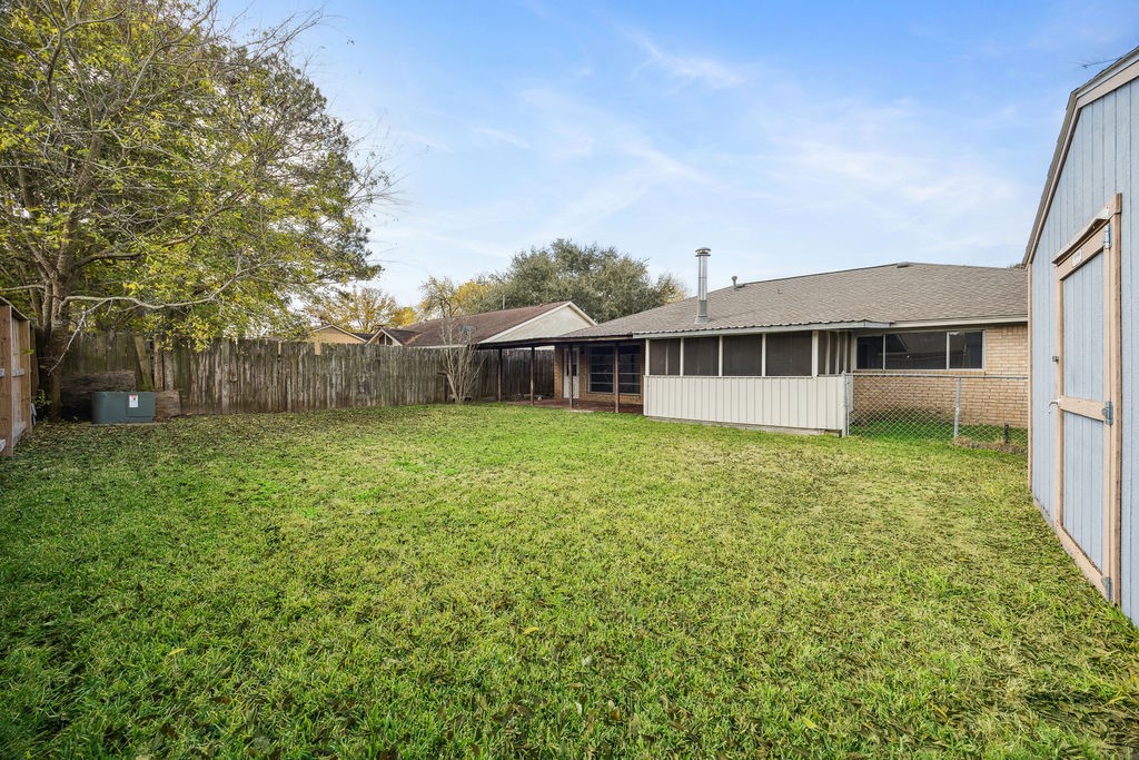 4019 Danpree Street Pasadena, TX 77504 - Photo 19 of 20 a view of a house with a backyard