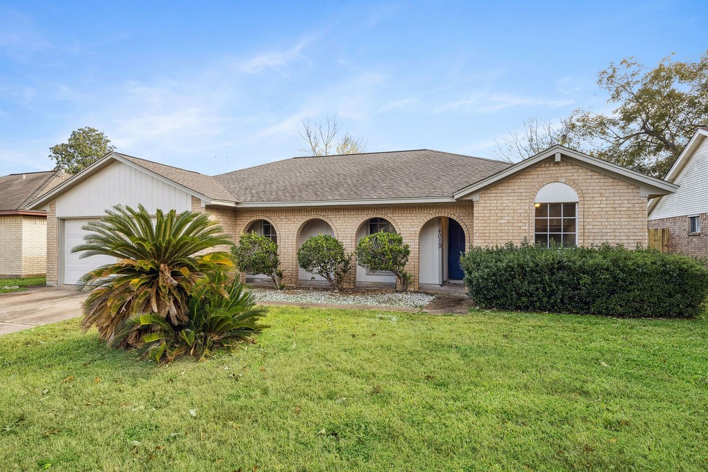 4019 Danpree Street Pasadena, TX 77504 - Photo 2 of 20 a front view of house with yard and outdoor seating