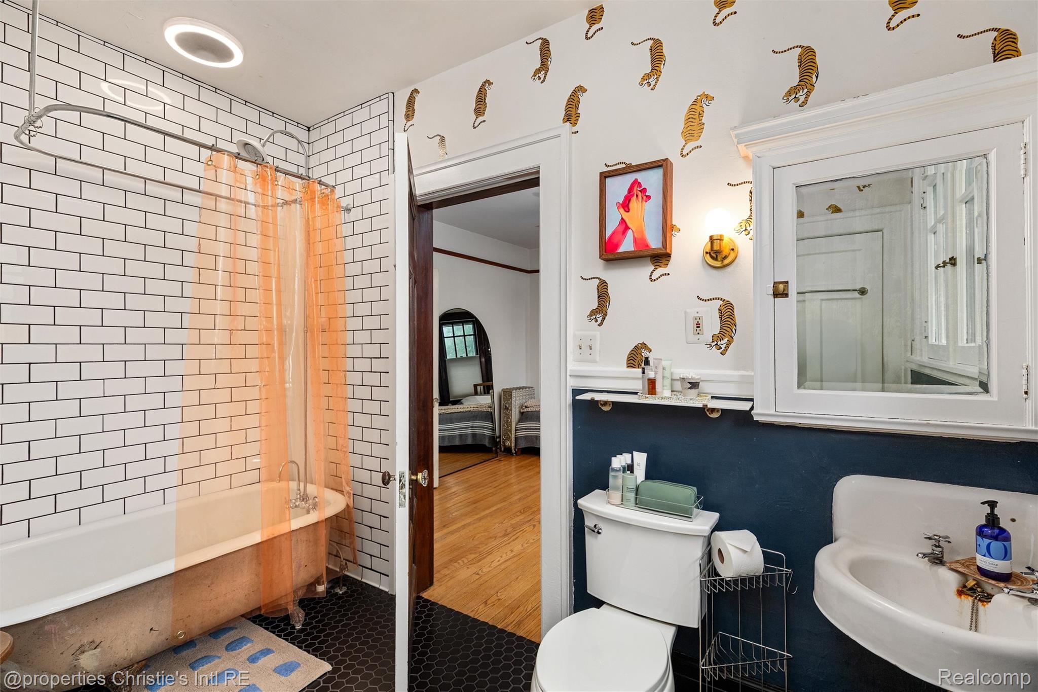 36 Longfellow Street Detroit, MI 48202 - Photo 41 of 81 Full bathroom with a combined bath / shower with freestanding tub and tile patterned floors
