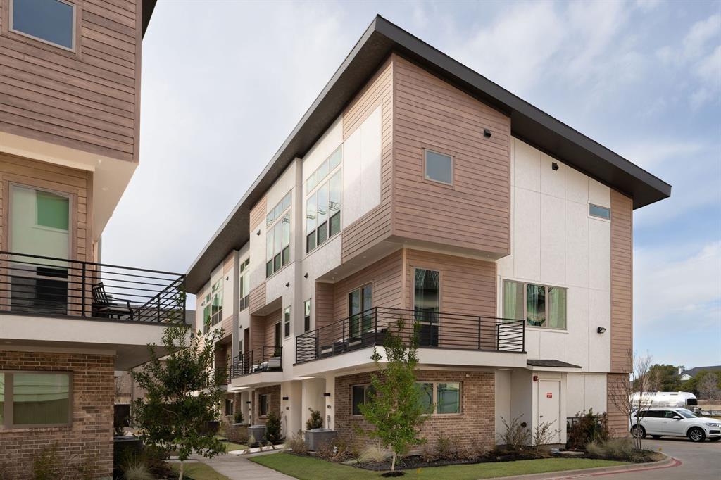 13900 Noel Road, Unit 203 Dallas, TX 75240 - Photo 1 of 11 a view of a house with street