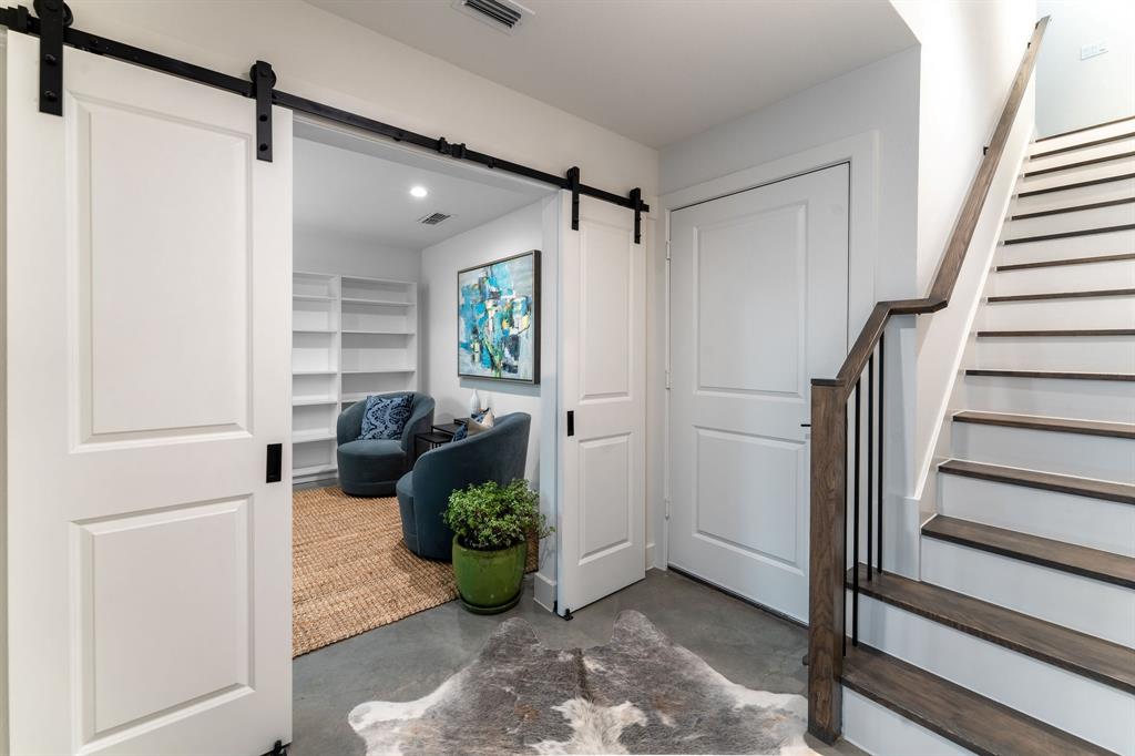 13900 Noel Road, Unit 203 Dallas, TX 75240 - Photo 2 of 11 a view of entryway with livingroom and furniture