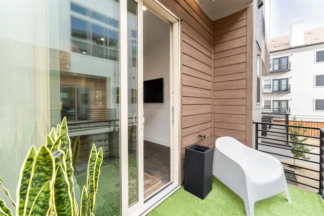 a bed room with a bed and a window