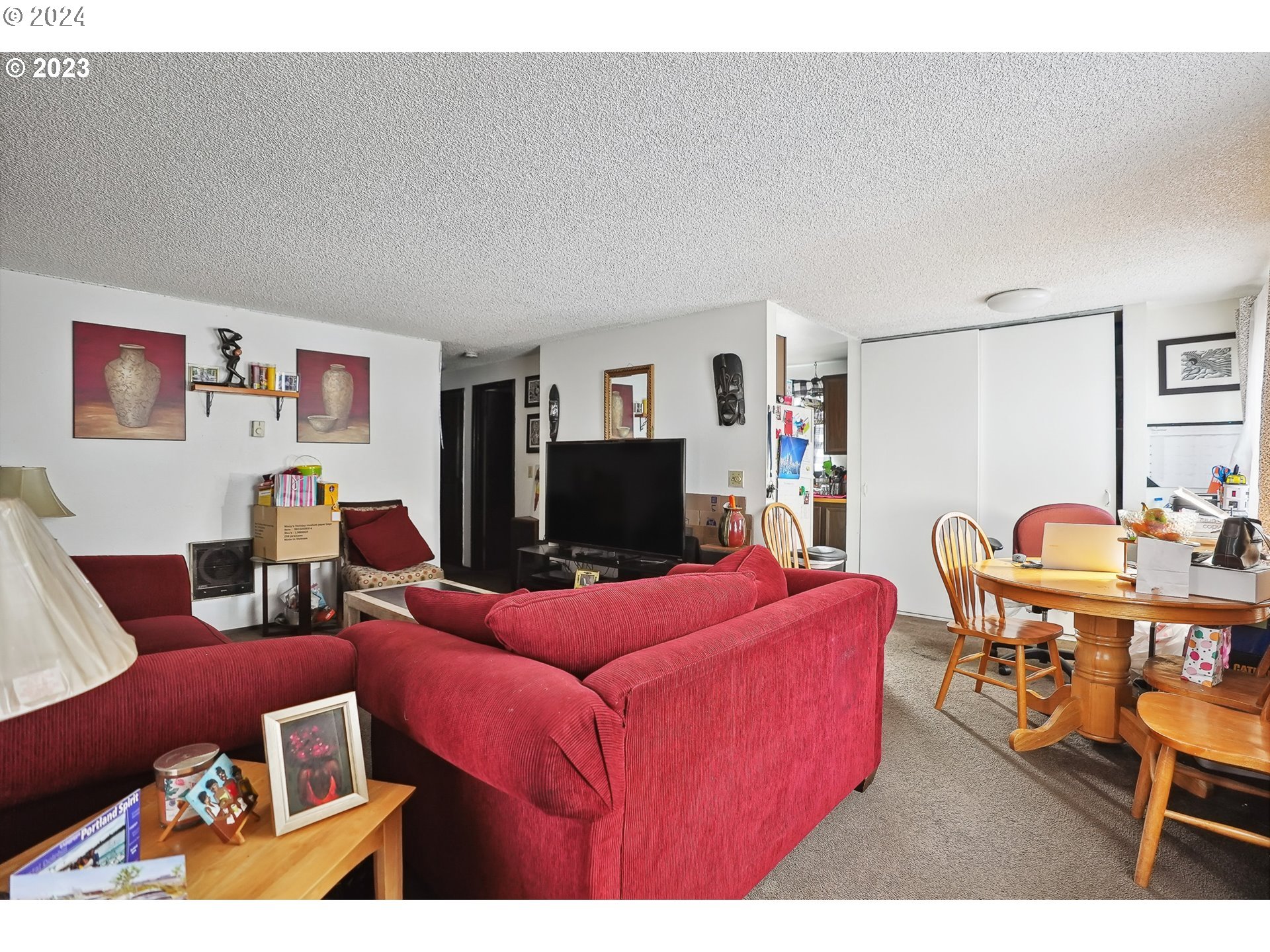 9630 Southeast Foster Road Portland, OR 97266 - Photo 18 of 33 a living room with furniture and a flat screen tv