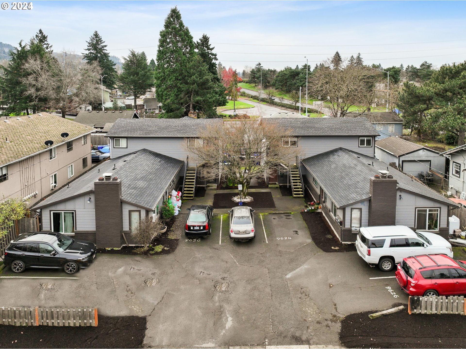 9630 Southeast Foster Road Portland, OR 97266 - Photo 2 of 33 an aerial view of a house with garden