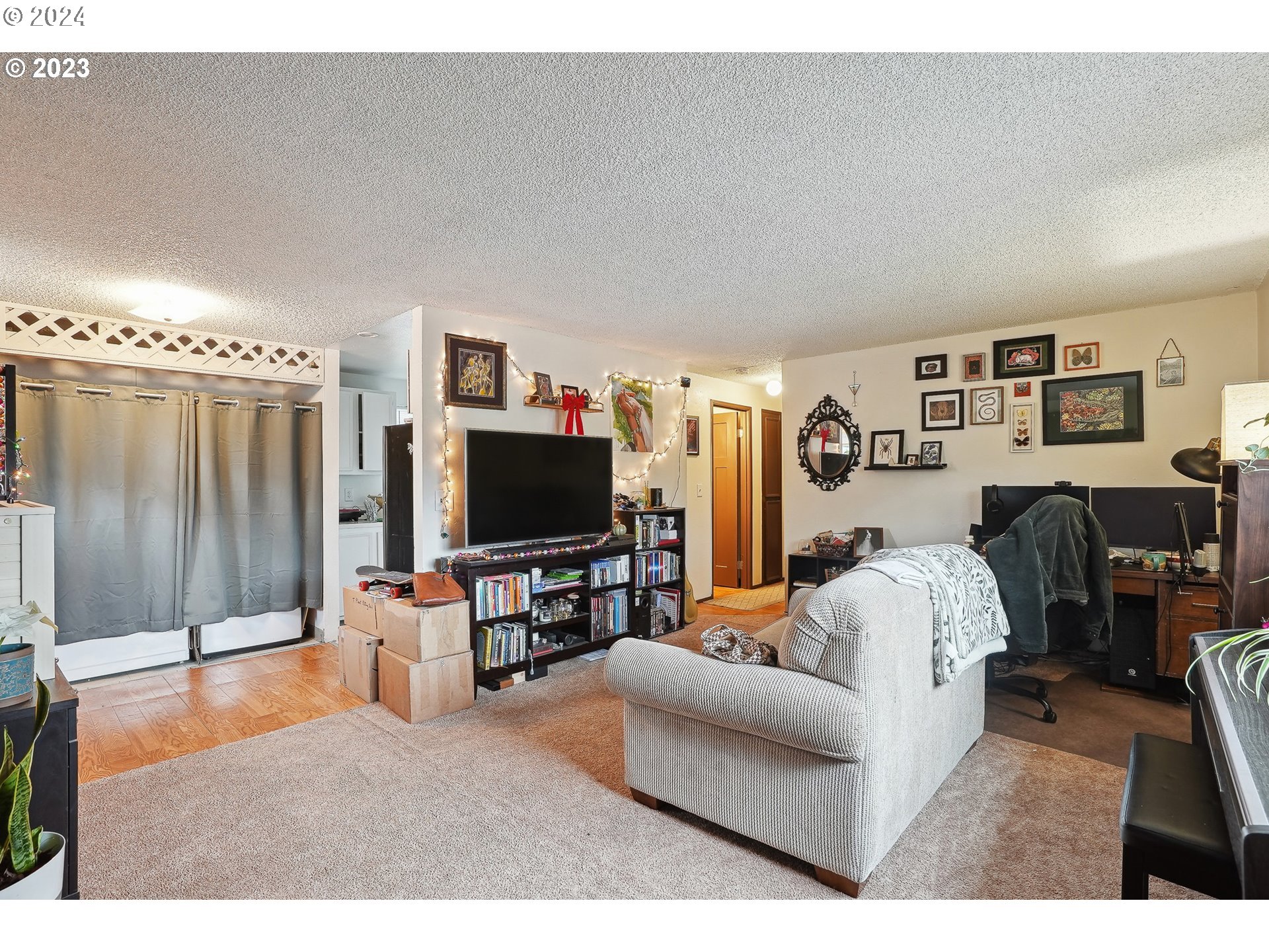 9630 Southeast Foster Road Portland, OR 97266 - Photo 27 of 33 a living room with furniture and a flat screen tv