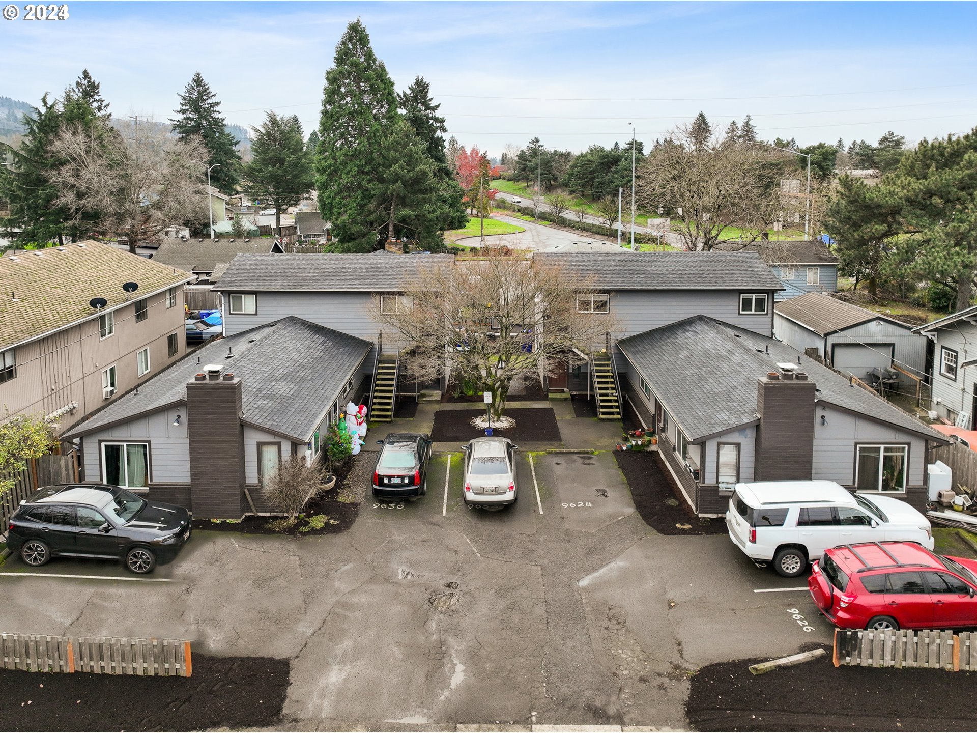 9630 Southeast Foster Road Portland, OR 97266 - Photo 6 of 33 a view of a car park in front of a building