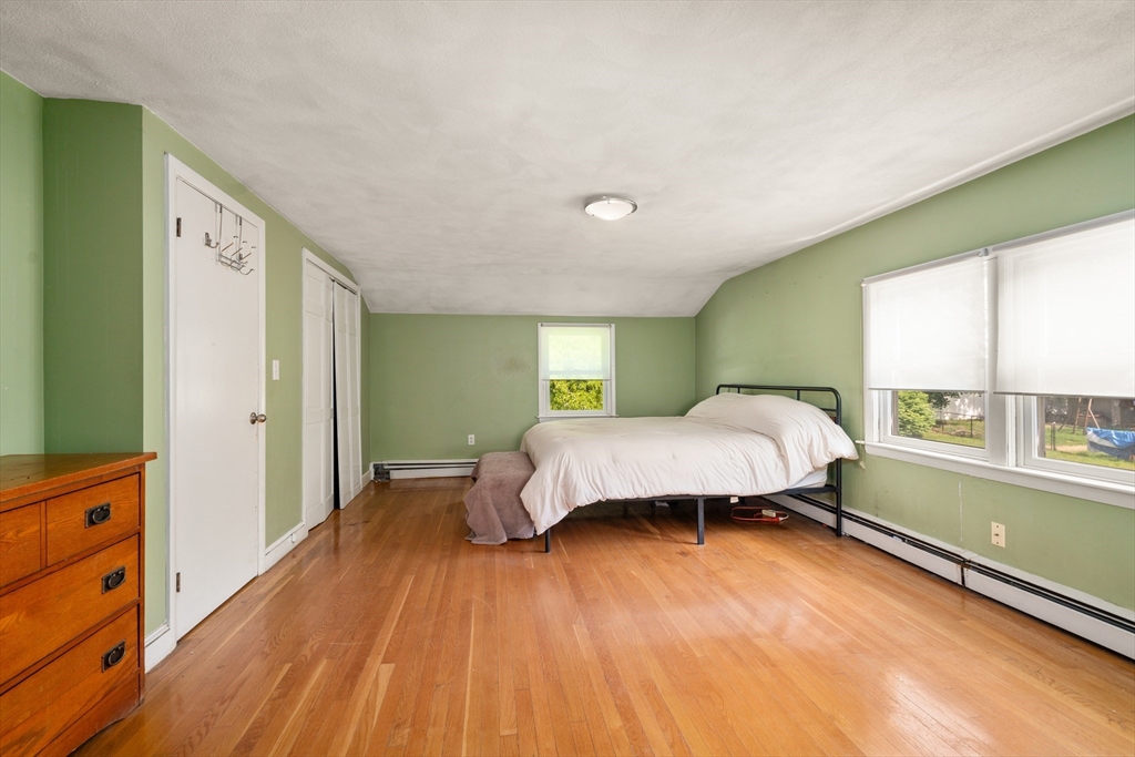 34 Irving Drive Walpole, MA 02081 - Photo 11 of 20 a bedroom with a bed and a window