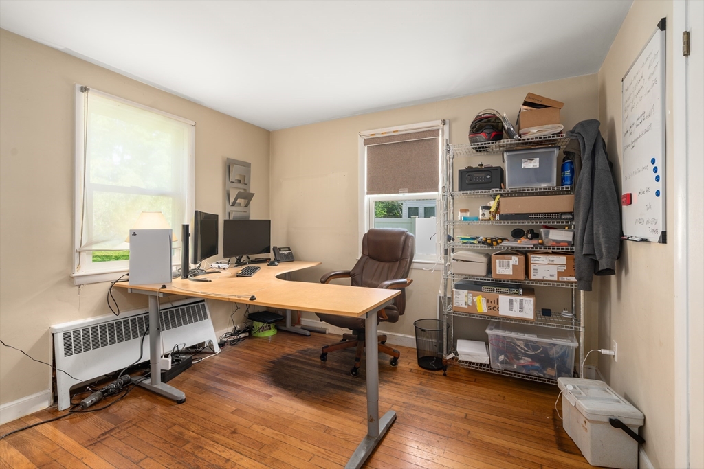 34 Irving Drive Walpole, MA 02081 - Photo 12 of 20 a view of a workspace with furniture and a window