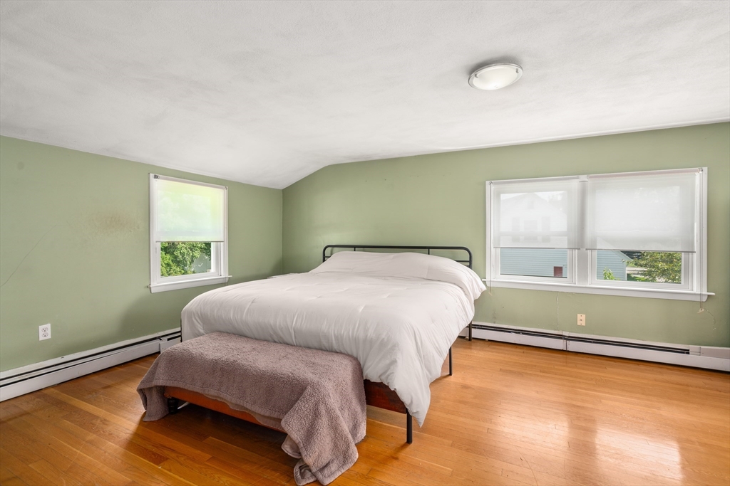 34 Irving Drive Walpole, MA 02081 - Photo 13 of 20 a bedroom with a bed and window