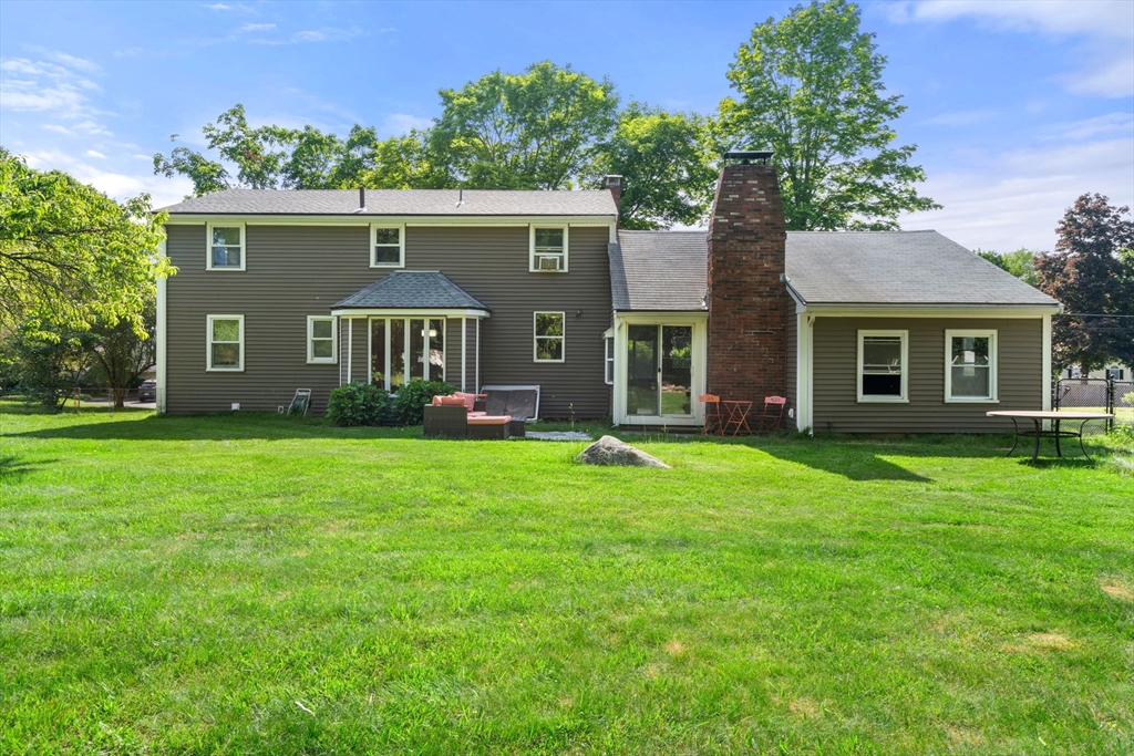 34 Irving Drive Walpole, MA 02081 - Photo 18 of 20 front view of a house with a yard