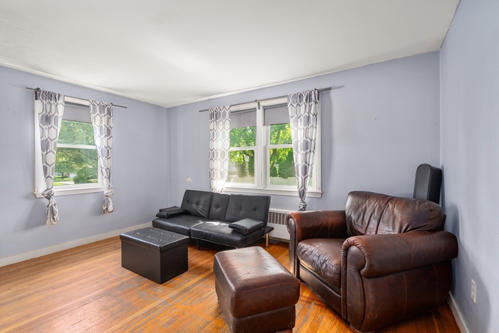 34 Irving Drive Walpole, MA 02081 - Photo 4 of 20 a living room with furniture and a window