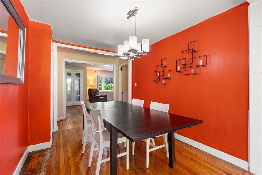 34 Irving Drive Walpole, MA 02081 - Photo 5 of 20 a dining room with table chairs and wooden floor