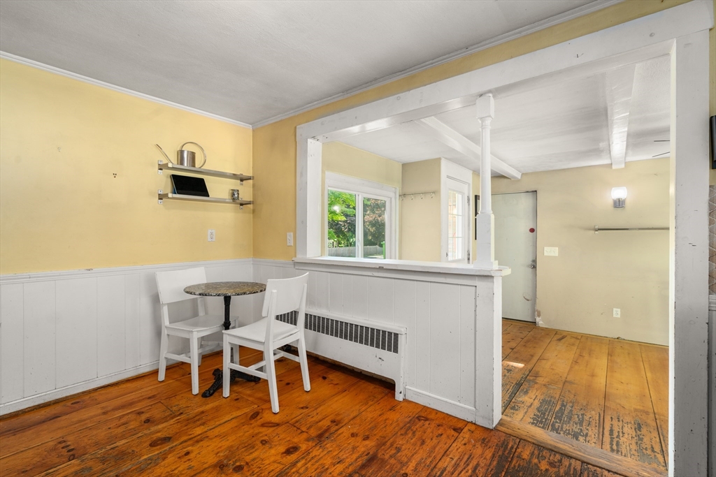 34 Irving Drive Walpole, MA 02081 - Photo 7 of 20 a view of a dining room with furniture and wooden floor