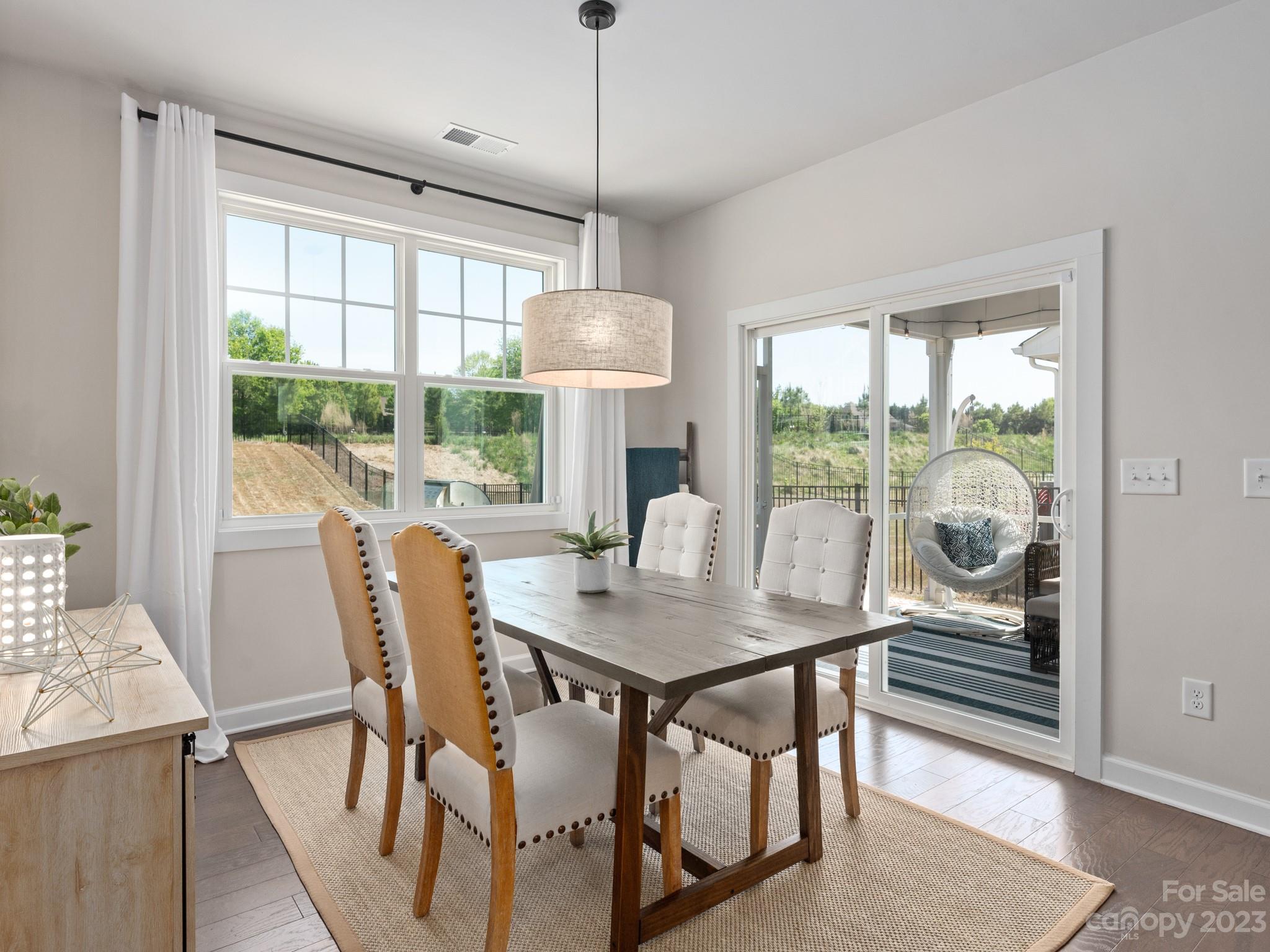 413 Hudson Place Davidson, NC 28036 - Photo 12 of 38 a view of a dining room with furniture window and outside view