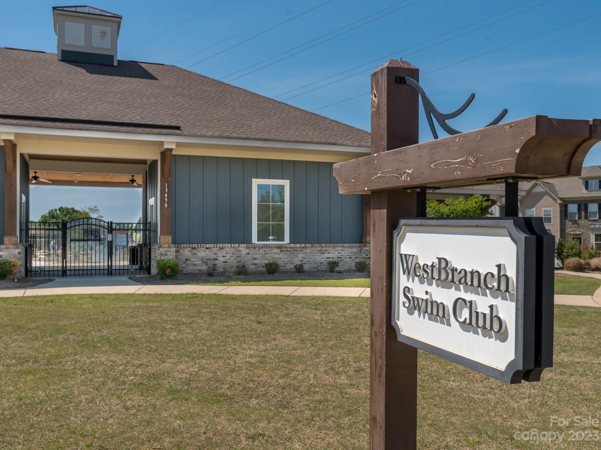413 Hudson Place Davidson, NC 28036 - Photo 32 of 38 a sign on the side of a building
