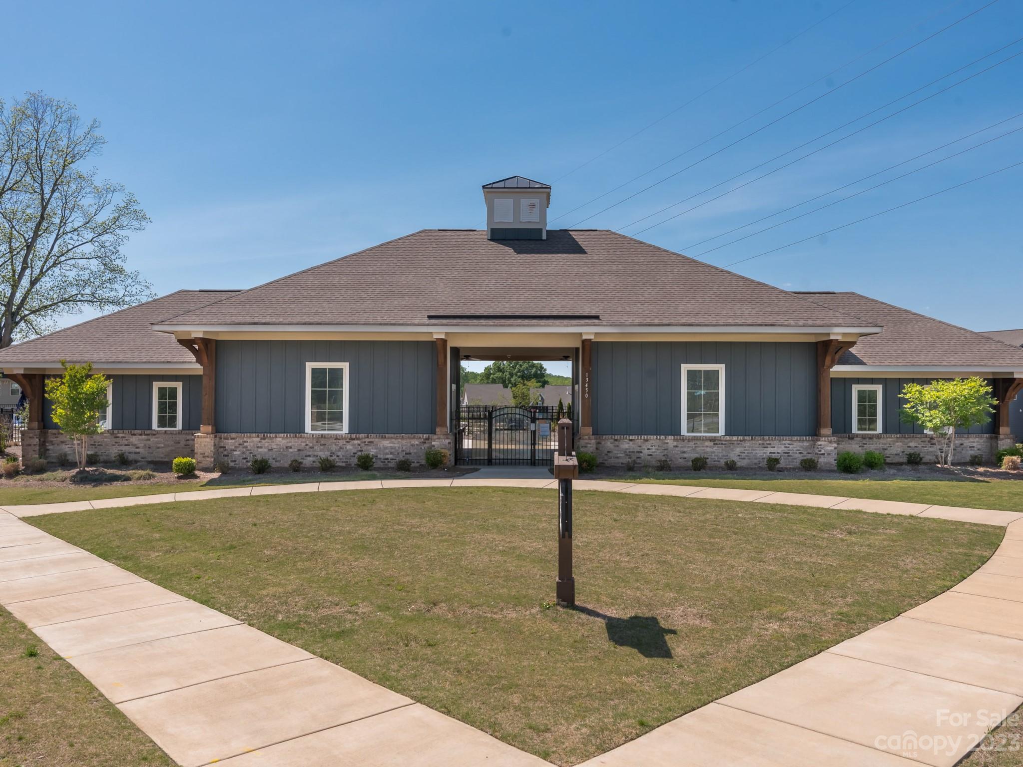 413 Hudson Place Davidson, NC 28036 - Photo 33 of 38 a front view of a house with a yard