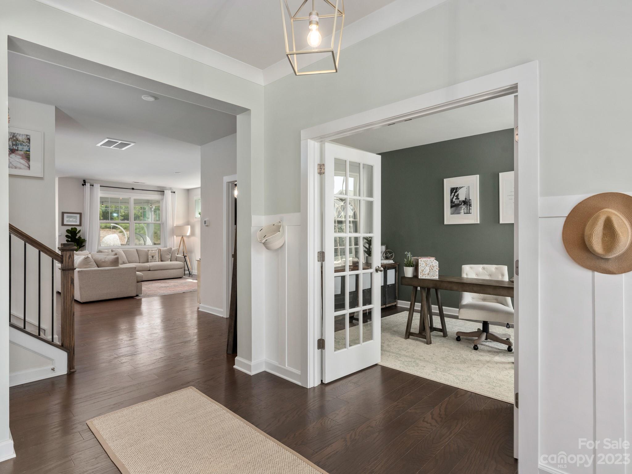 413 Hudson Place Davidson, NC 28036 - Photo 4 of 38 a view of a livingroom with workspace and living room
