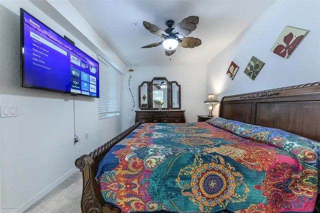 a bathroom with a double vanity sink mirror and toilet