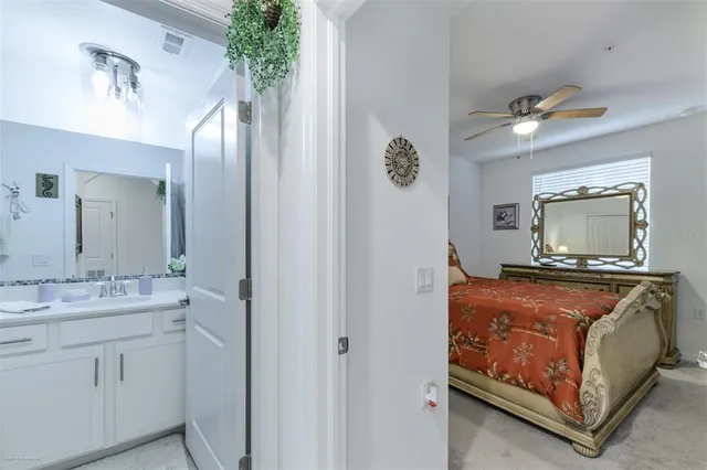 a view of a lake with houses in the back