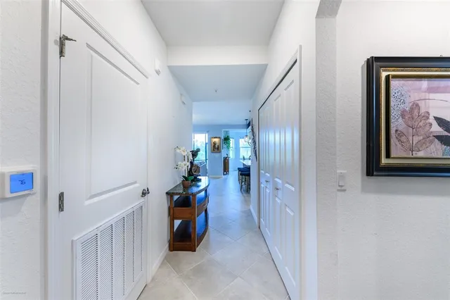 a view of a swimming pool with an outdoor seating