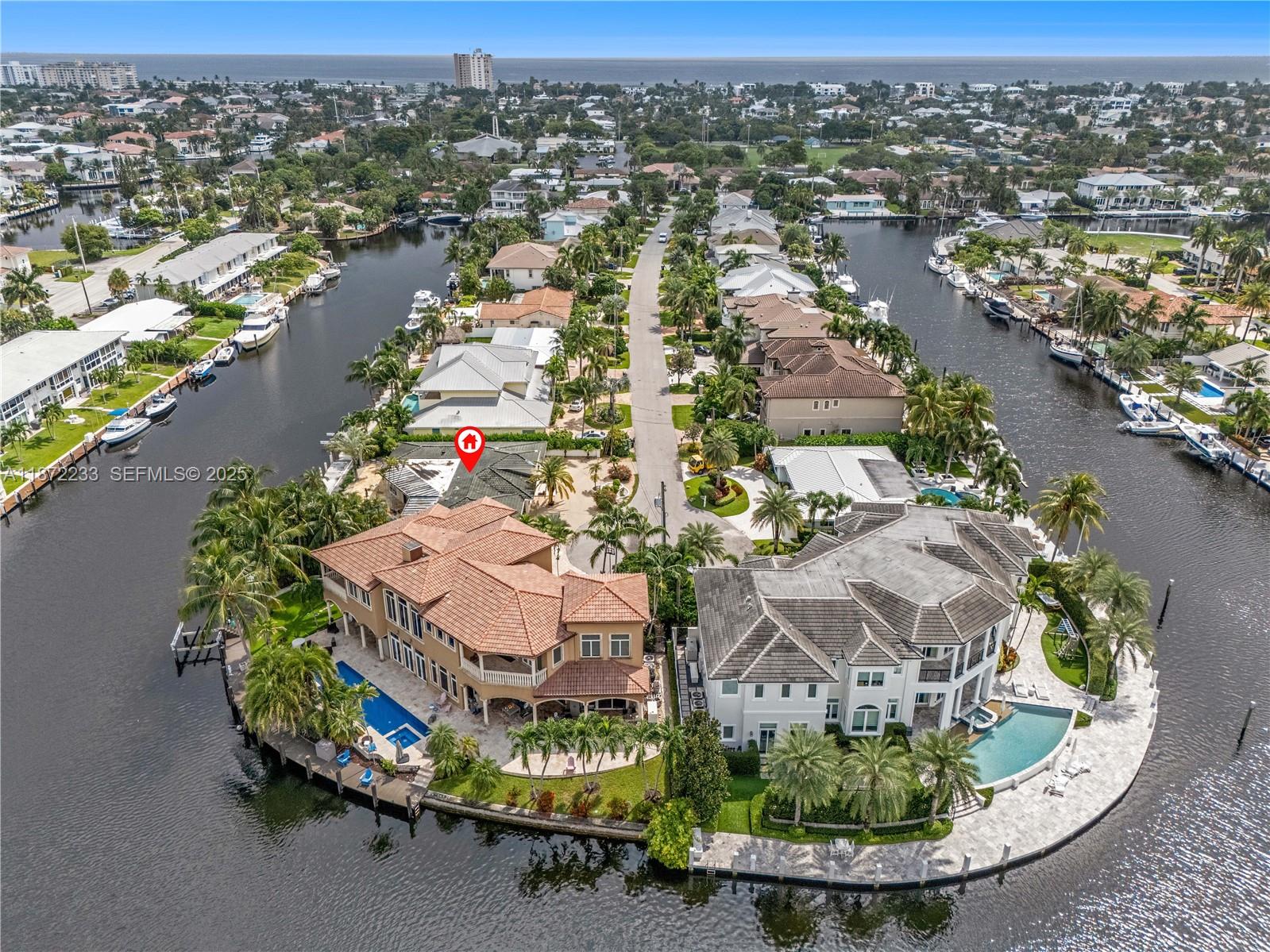 an aerial view of residential houses with outdoor space