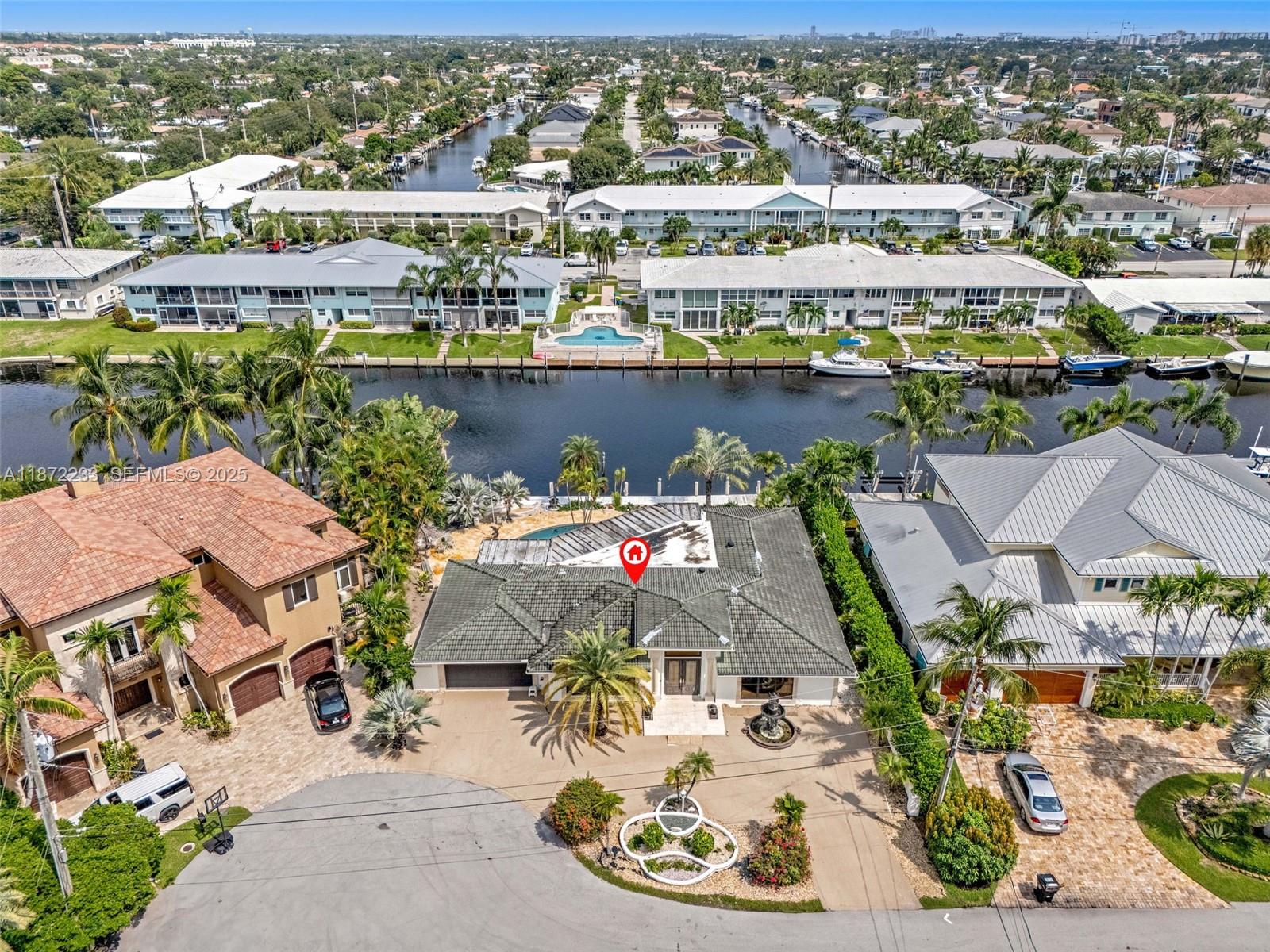 2321 Northeast 35th Street Lighthouse Point, FL 33064 - Photo 2 of 5 an aerial view of residential houses with outdoor space