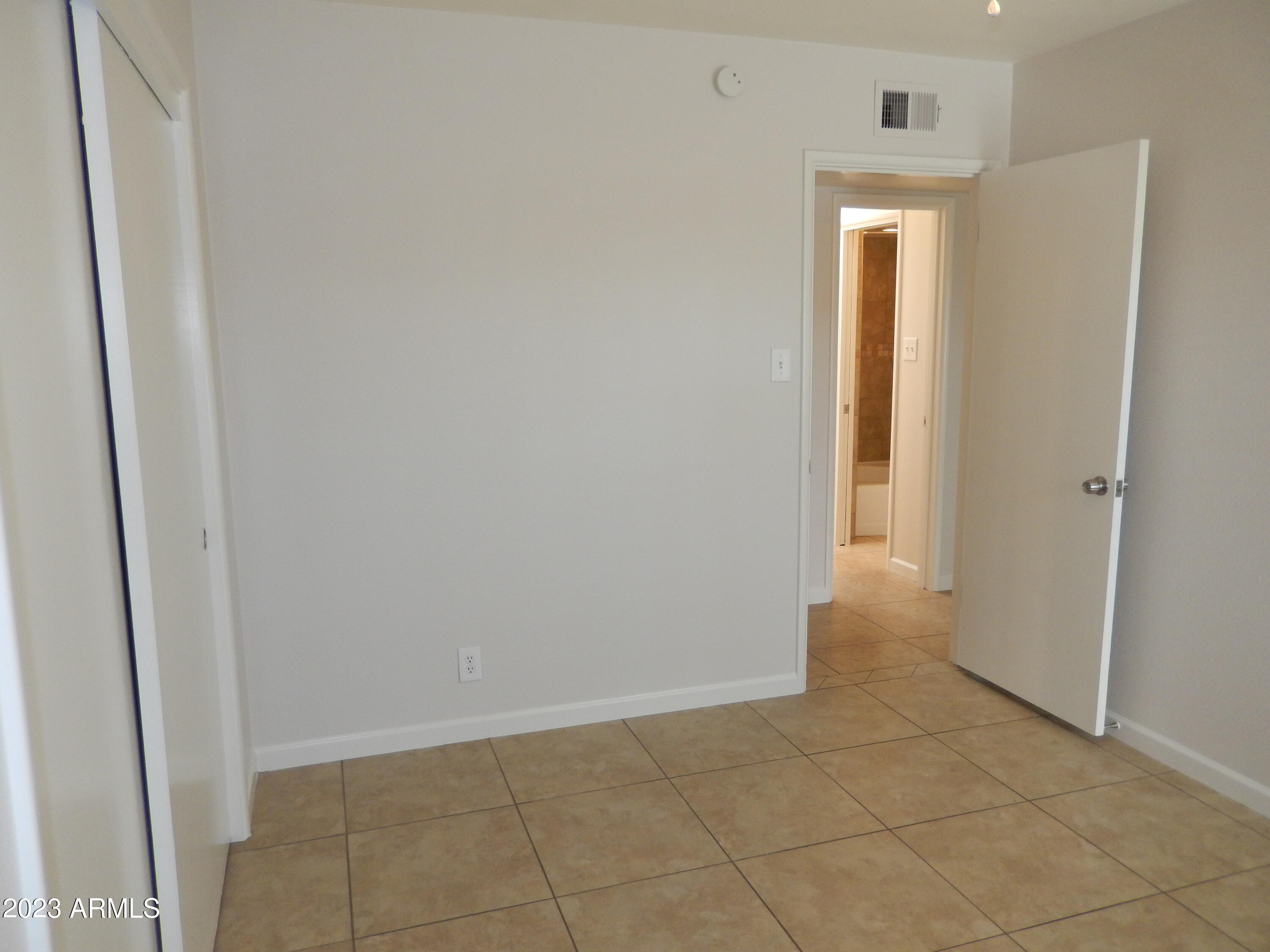 3618 East Montecito Avenue, Unit 2 Phoenix, AZ 85018 - Photo 11 of 17 a view of an empty room