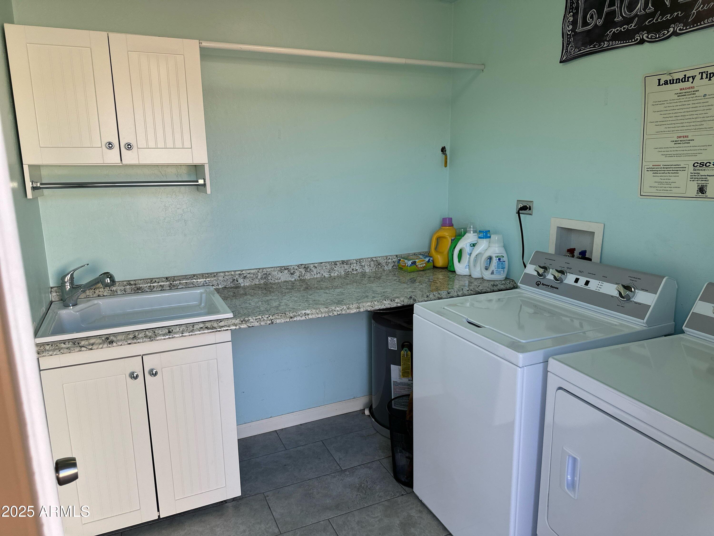 3618 East Montecito Avenue, Unit 2 Phoenix, AZ 85018 - Photo 17 of 17 a kitchen with a sink a stove and cabinets