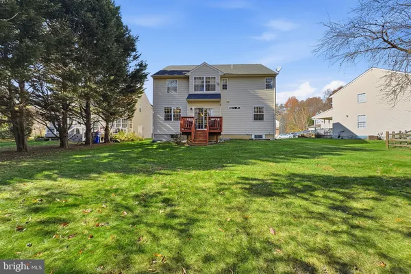 a view of a house with a big yard
