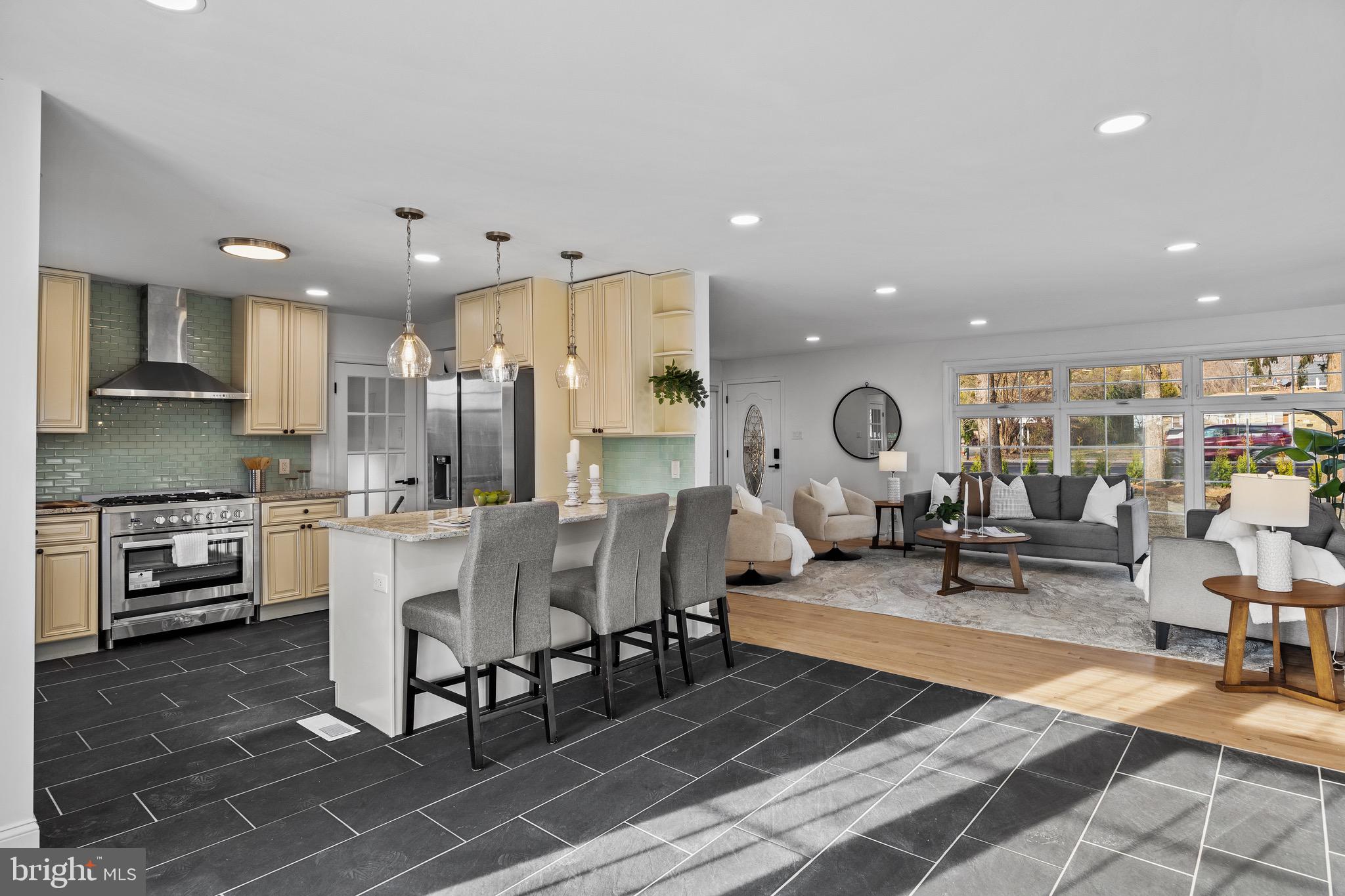 1221 Huntingdon Pike Huntingdon Valley, PA 19006 - Photo 11 of 48 a living room with furniture and a kitchen