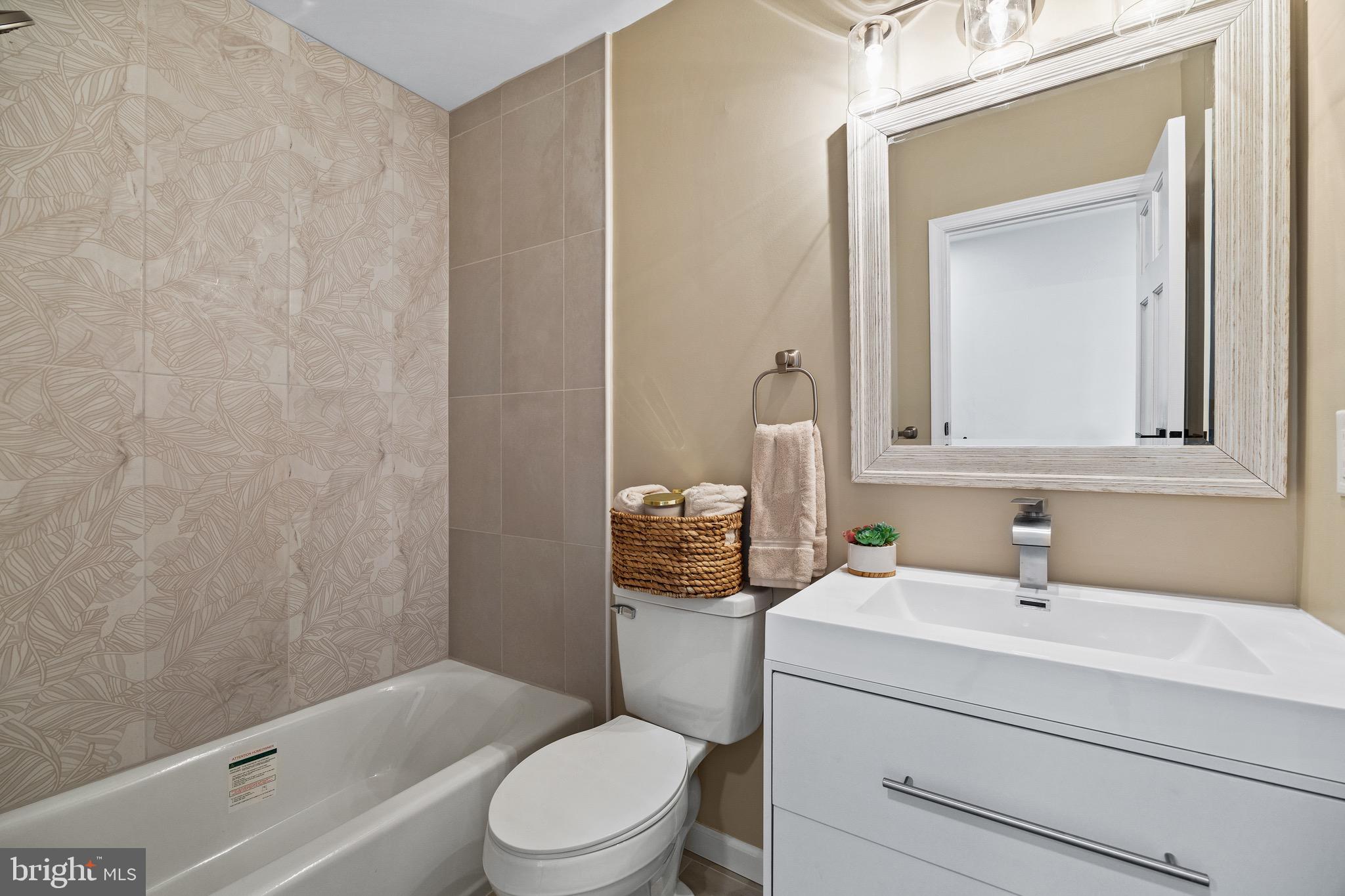1221 Huntingdon Pike Huntingdon Valley, PA 19006 - Photo 19 of 48 a bathroom with a sink a toilet and shower