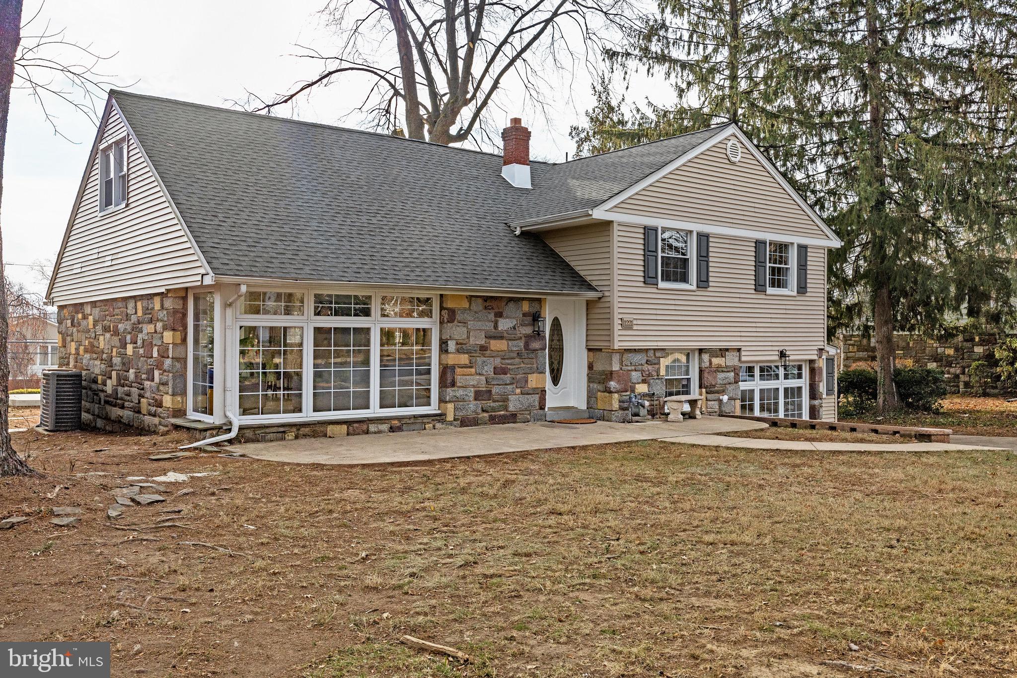 1221 Huntingdon Pike Huntingdon Valley, PA 19006 - Photo 2 of 48 a front view of a house with a yard